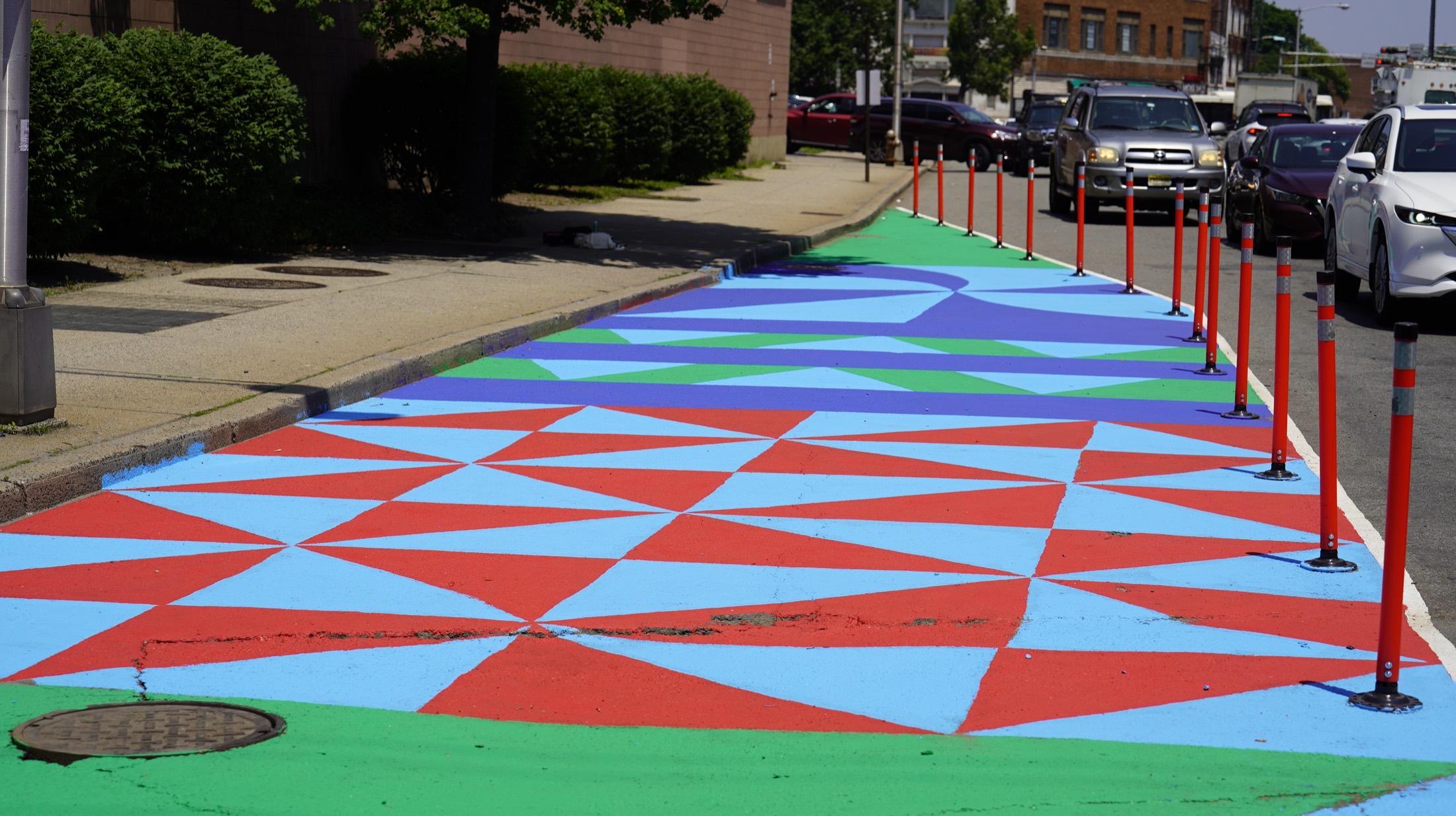 Completed geometric asphalt mural detail