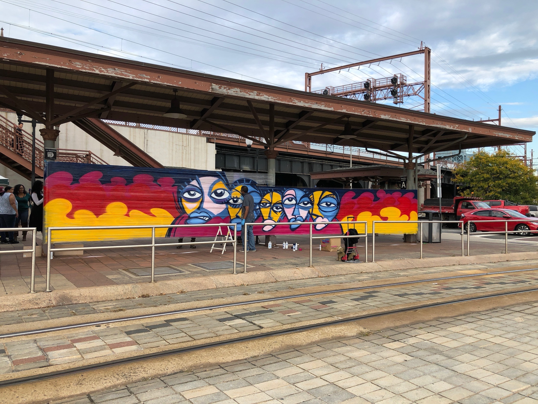 Completed multi-face mural panel at Broad Street Station