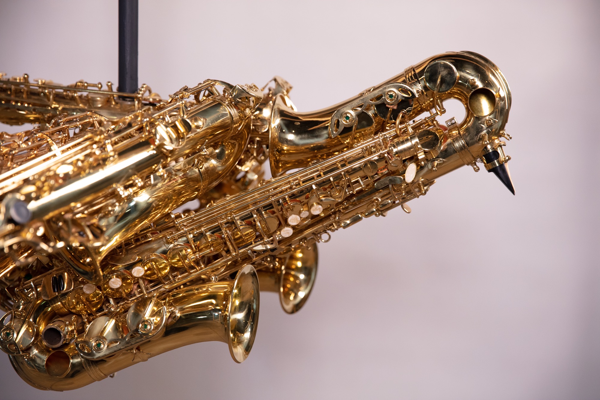 Detail of layered saxophone keys and bird wing form